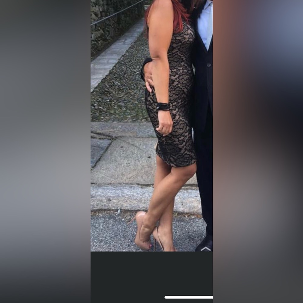 Sleeveless black with nude underlay mock neck dress